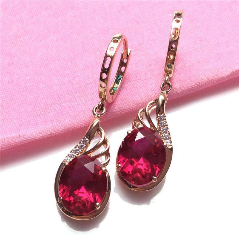 Purple Gold Shiny Red Stone Egg Surface Ear Buckle Simple Luxury Temperament Design Rose Gold Plated Earrings