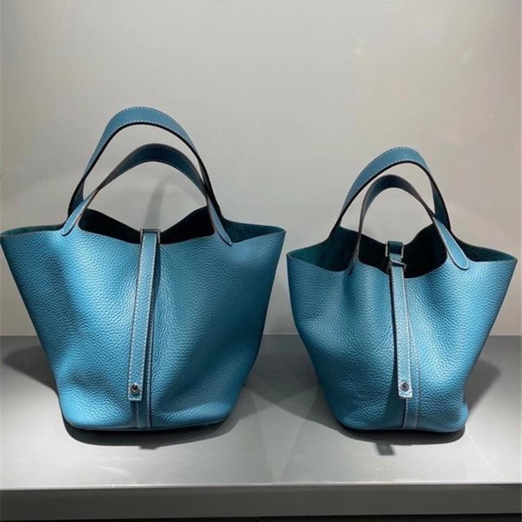 2023 Nowa damska torba ze skóry bydlęcej pierwszej jakości, wzór liczi, koszyk warzywny, worek typu bucket bag, modna i prosta, codzienna torebka