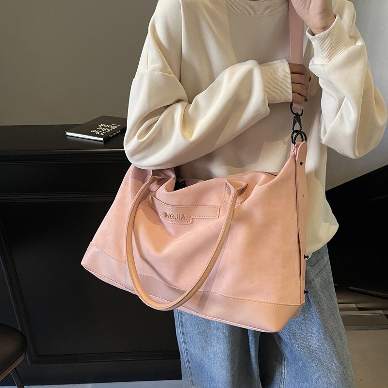 Short-haul travel bags, men's and women's large-capacity fashion shoulder bags, convenient and versatile handbags, and large bags for storage.