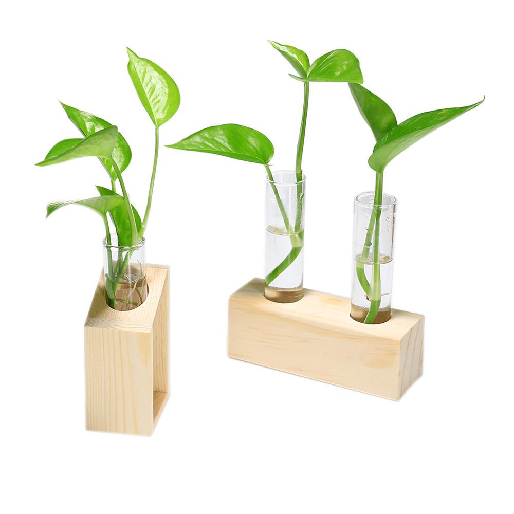 Vaso a bulbo trasparente con supporto in legno fioriera in