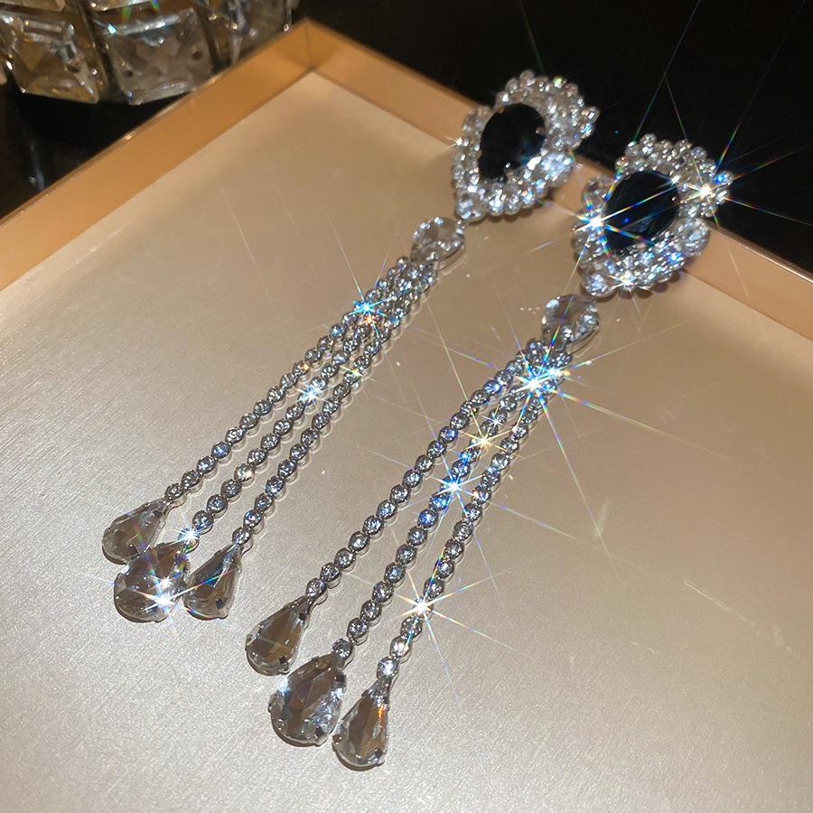 Silver Needle Water Drop Tassel Earrings - Light Luxury High-End Design for Women's Fashion.