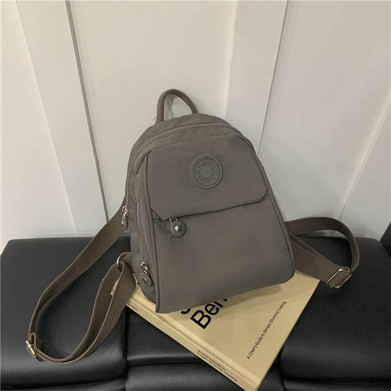 Schoolbag Japanese mini bag Oxford cloth backpack women's waterproof 1011 new fashionable versatile canvas small backpack