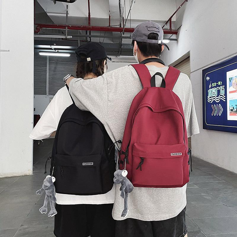 New Casual Backpack Simple College Style Backpack Large Capacity Student Bag Men and Women Couple Bag Travel Bag