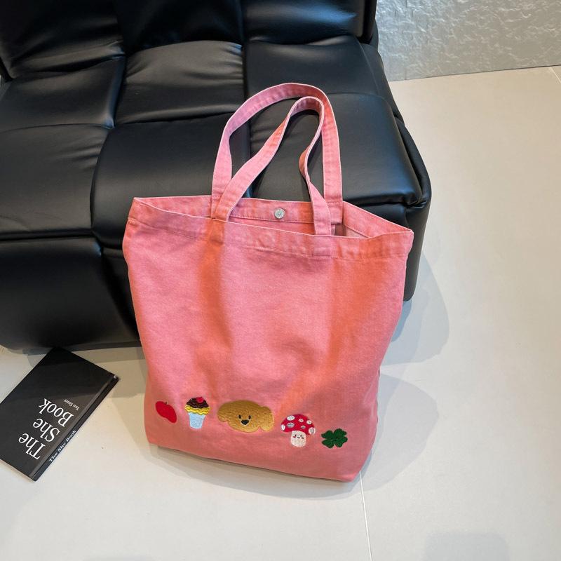 Casual canvas bag design sense niche women's bag 2025 new cartoon printed tote bag large capacity shoulder bag