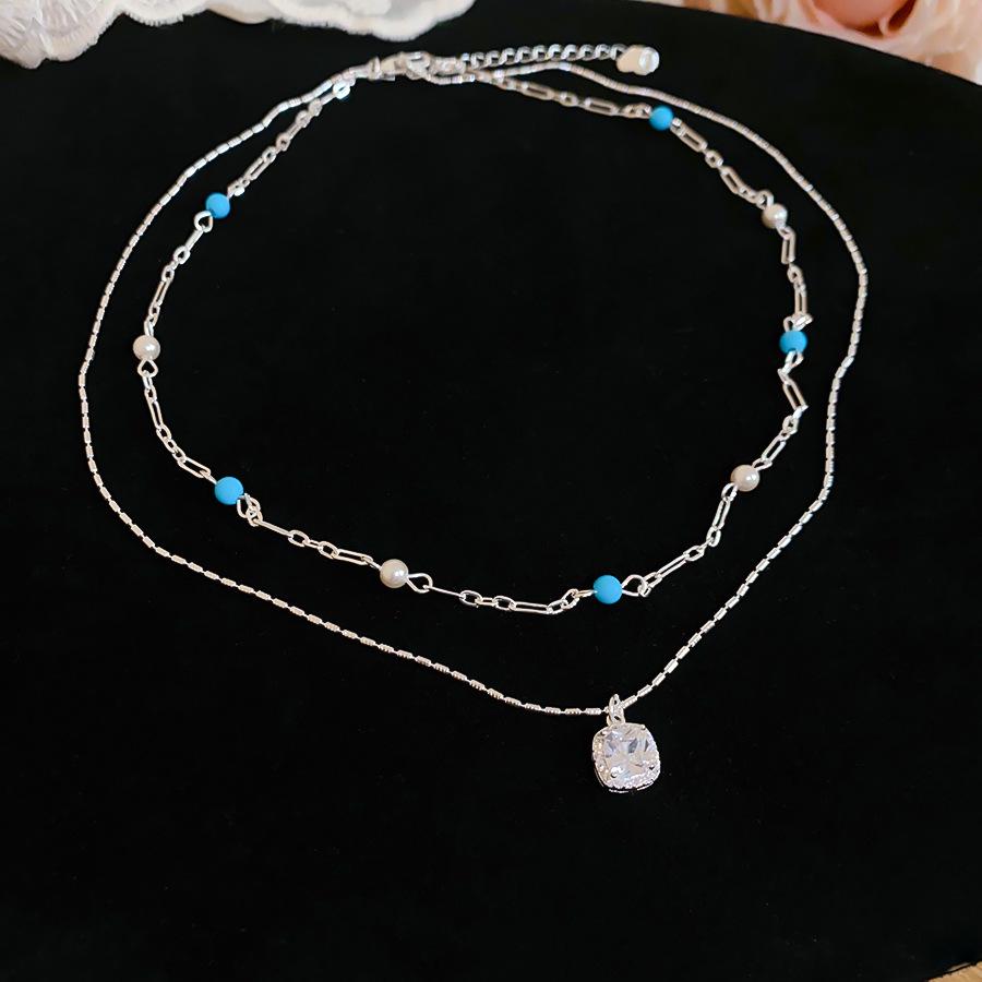 Luxury Double-Layer Pearl Zirconia Square Geometric Necklace - Versatile Clavicle Chain for Chic Commuting