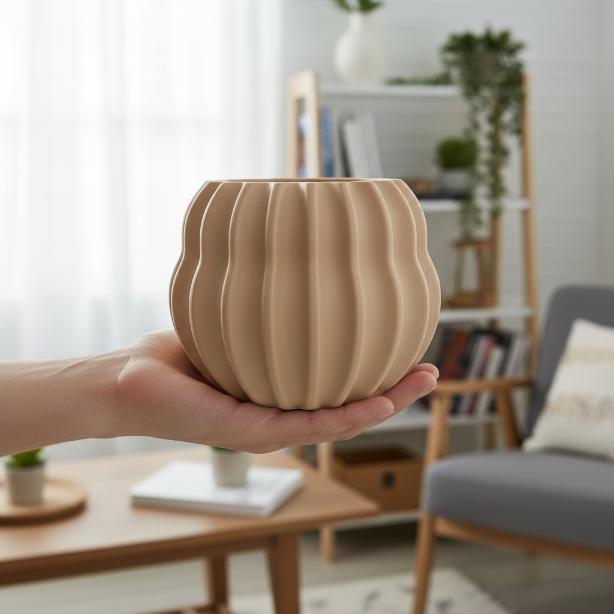 Modern beige barrel-shaped plant pot