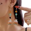 Popular Halloween earrings series, dripping pumpkin ghost black orange twisted earrings female, niche design sense