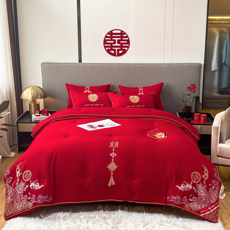 Four-Piece Red Bridal Chamber Wedding Bedding Set with Embroidered Duvet Cover and Bed Sheet.