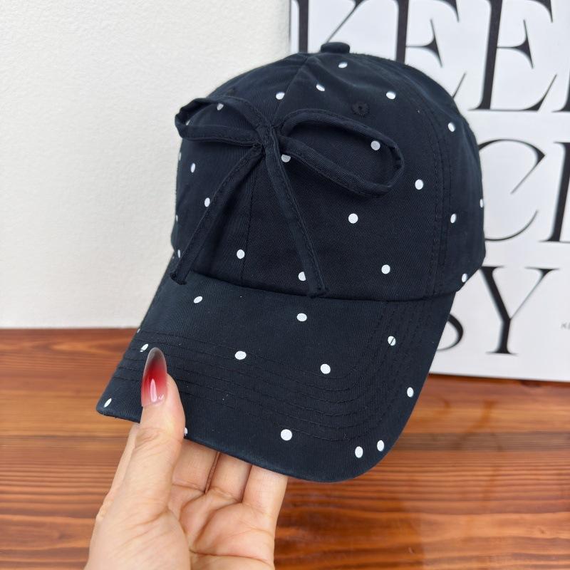 Korean black and white polka dot bow baseball cap female versatile sweet cute niche design show face small cap
