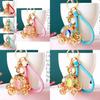 Elegant Pumpkin Car Charm Keychain Accessory For Women With Metallic Finish And Colorful Ropes Ideal For Gifts And Special Occasions