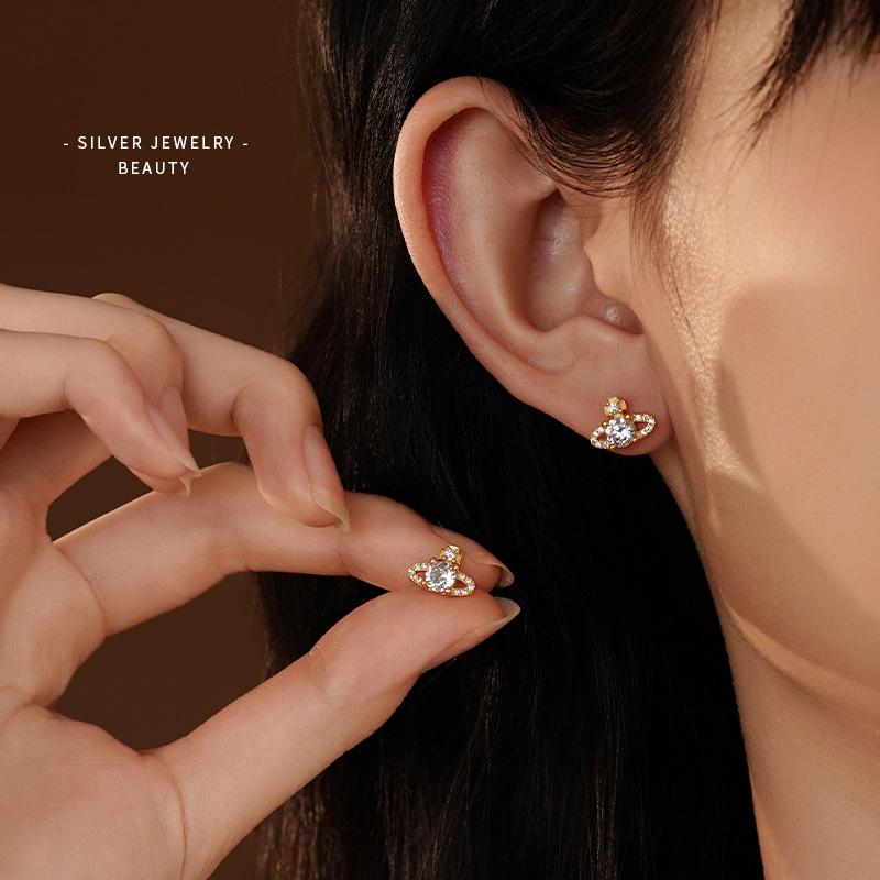 Ohrstecker Saturn aus S925 Sterlingsilber im koreanischen Stil für Damen - Mit Diamanten besetzt, super glänzend, kleines leicht luxuriöses Zirkon-Design