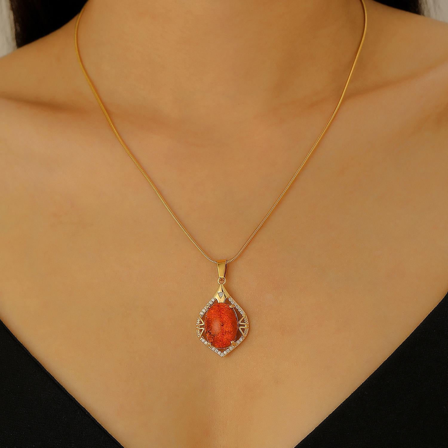 Oval Orange Stone Pendant Necklace Sparkling Accent Gold Tone Snake Chain Necklace for Women Elegant Jewelry
