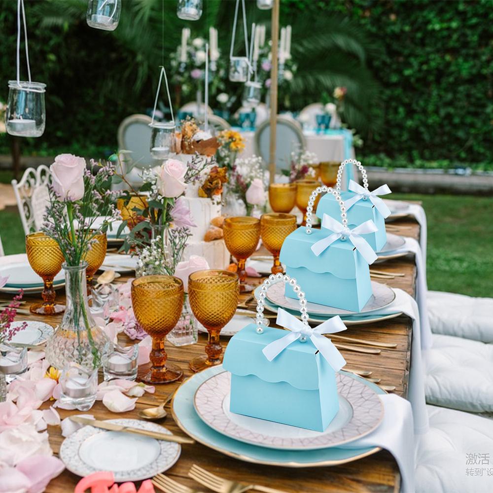 16sets Foldable Paper Wedding Candy Totes with White Imitation Pearl Round Beaded Handle and Ribbon Handbag Shape Light Cyan 13.9x6.1x10.7cm