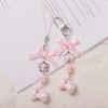 High-value pink electric donkey bow beaded mobile phone chain bag pendant ins wind keychain cute pendant female