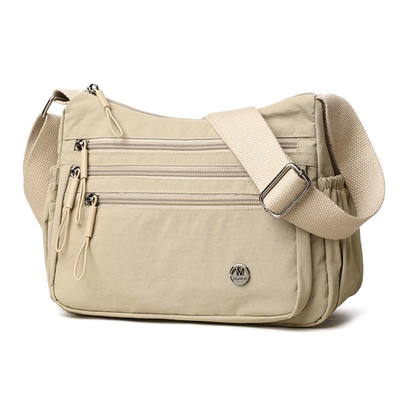 Dameskulderveske med stor kapasitet og lett vekt