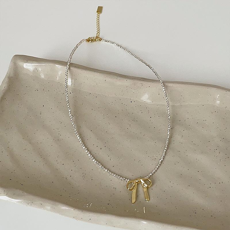 

Простое ожерелье с бисером в виде банта, женское, нишевое, дизайн, чувство, легкость, роскошь, элегантность, мода, темперамент, универсальная цепочка на шею, цепочка на ключицу