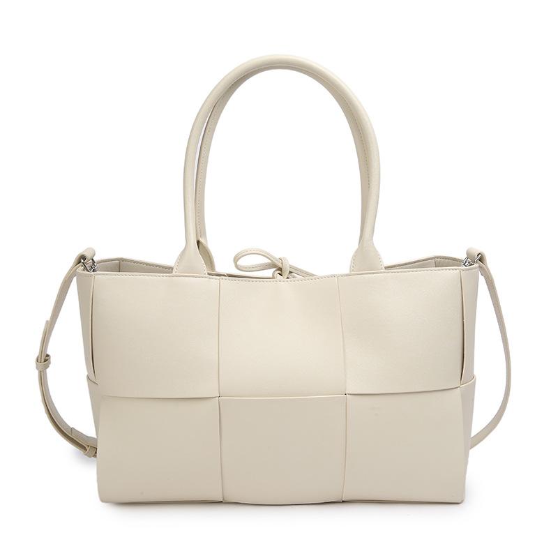 

New cowhide tote bag commuter high-end woven bag large capacity fashion personality portable leather women s bag