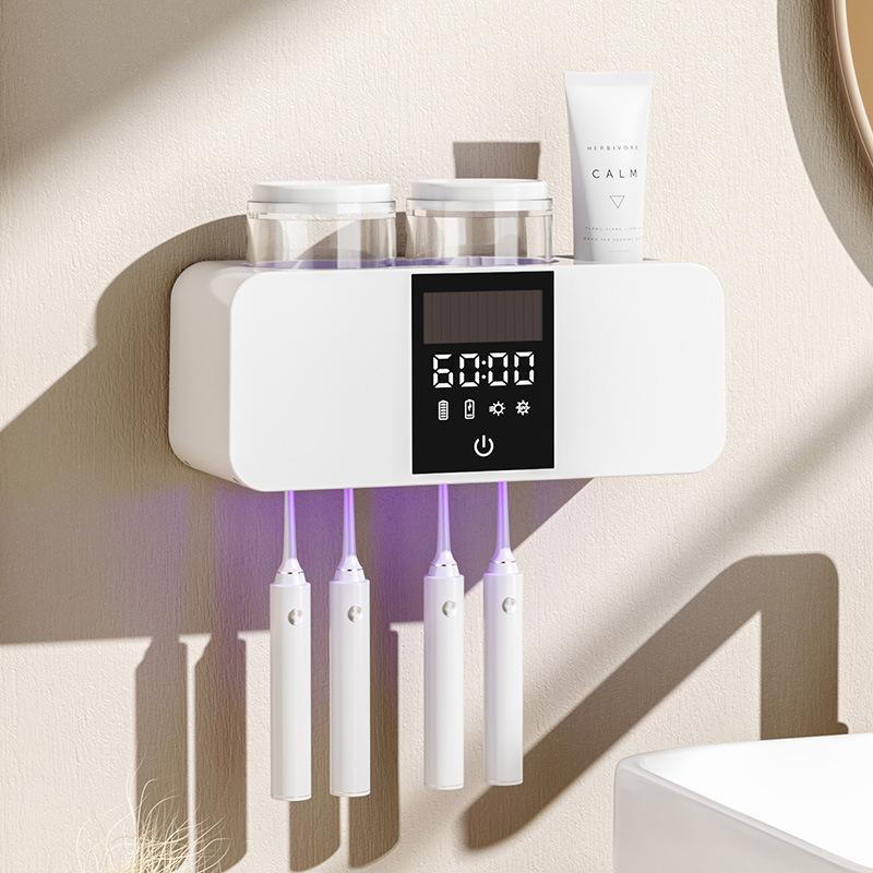 Olovvs Smart UV-Zahnbürstensterilisator mit elektrischer Trocknung, stanzfreier Installation, Mundspülbecher und Zahnpastahalter.