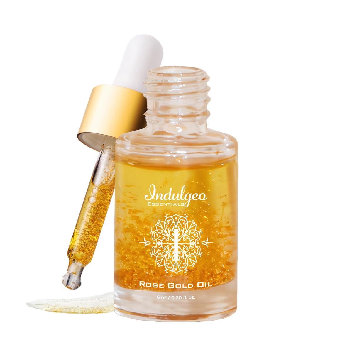 

Indulgeo Essentials Beauty Oil 24K Rose Gold 6 мл | Легкая база под макияж для сияющей кожи с частицами 24-каратного золота, маслом шиповника, витаминами C и E