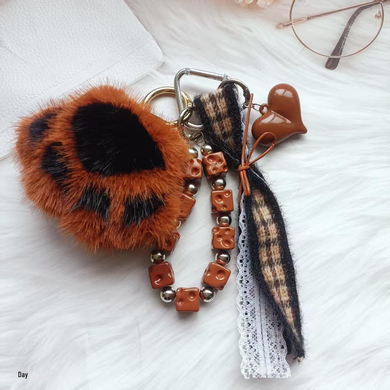 

Plush Cat Paw Chocolate Beaded Phone Charm