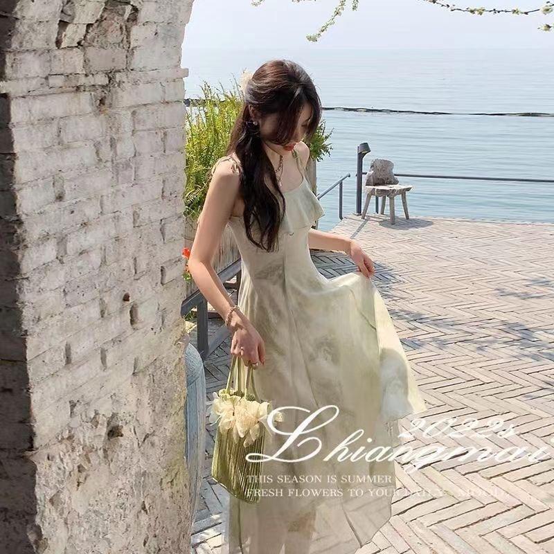 Koreanische Version des neuen Sommer-Träger-Langkleids Fee Lotusblatt-Kantenprint ärmellos Temperament-Kleid