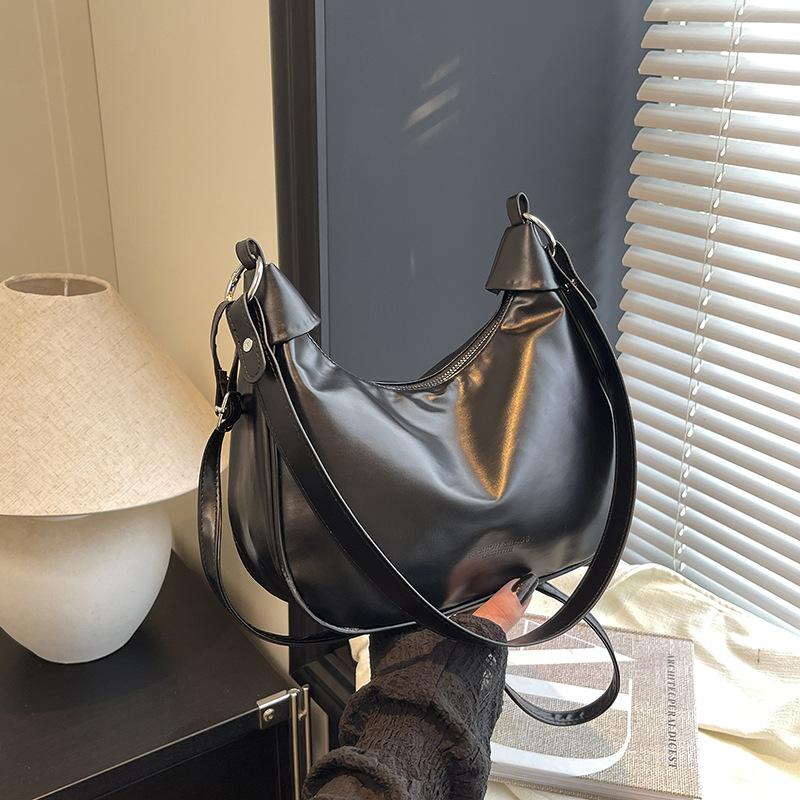 

Ретро круассан простая атмосфера женская сумка-пельмень для通勤 женская индивидуальность мода одно плечо косая сумка чёрный