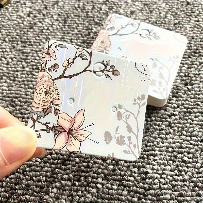100pcs Chic Floral Earring Display Cards - Durable Patterned Paper, Elegant Showcase Solution for Jewelry