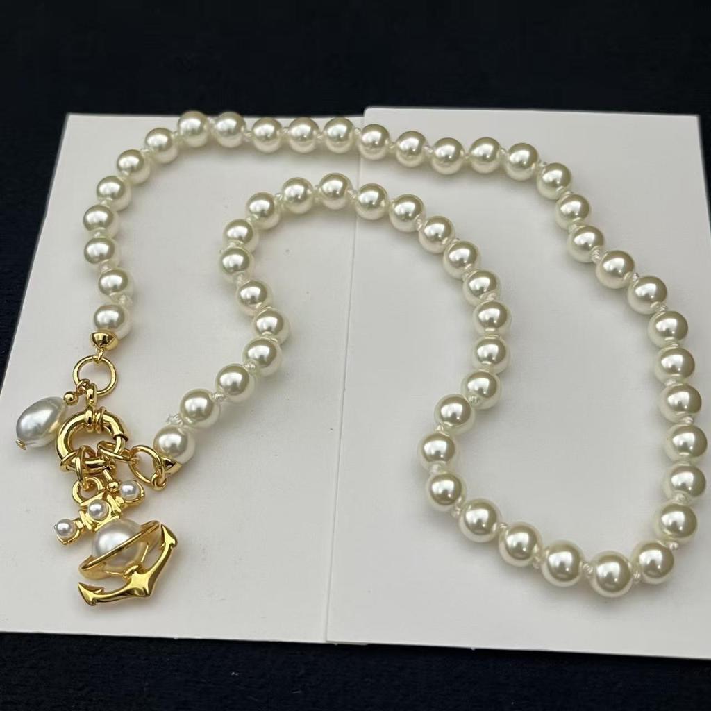 Empress Dowager Saturn Pearl Necklace, Bracelet, and Earrings Set: Light Luxury Punk Clavicle Chain for Women