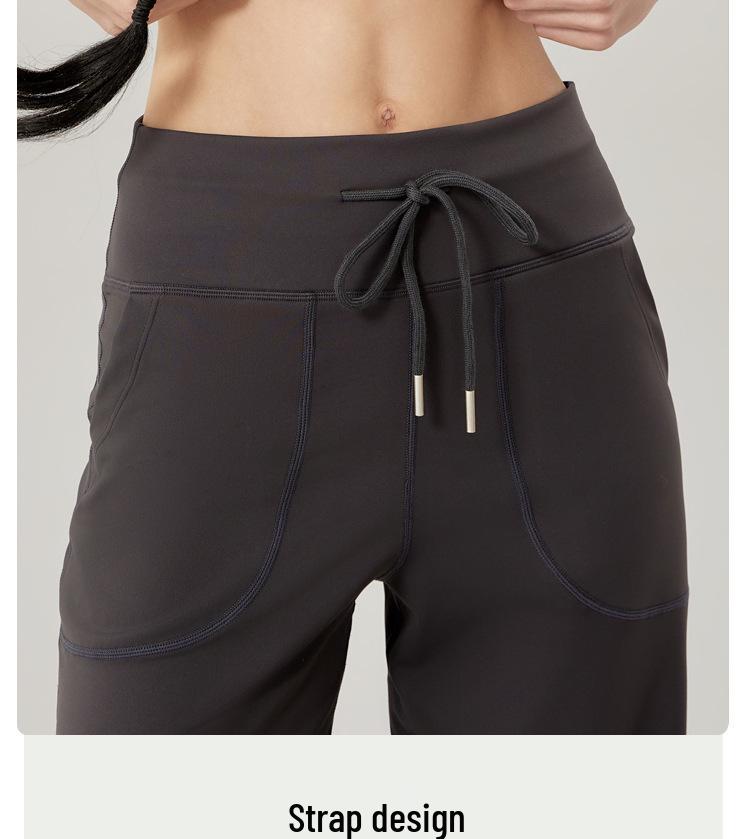 Dámské široké kalhoty se stahovací šňůrkou na jógu a fitness - Volné, ležérní a zeštíhlující design s rovnými nohavicemi