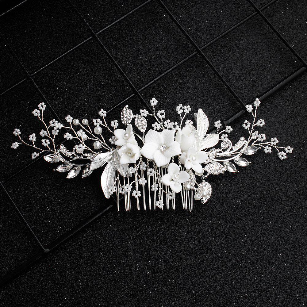 

Сделанный вручную свадебный гребень для волос с цветком из жемчуга и страз и листьями