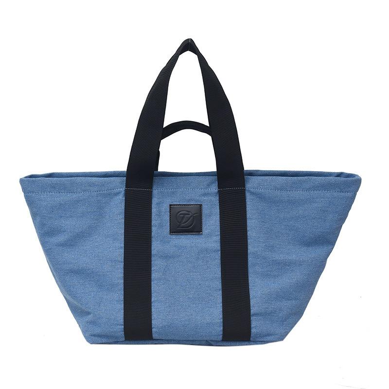

Casual large-capacity denim bag women s new lightweight and versatile commuter shoulder bag portable tote bag small світло-синій колір