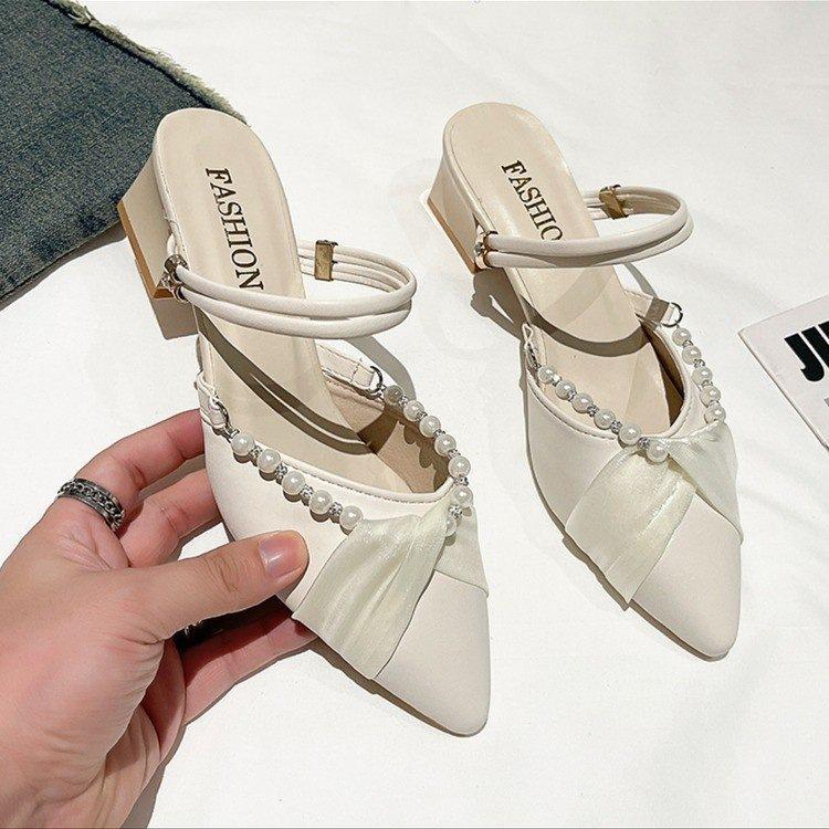 Summer evening breeze low-heeled sandals French beautiful bag head new summer wear semi-drag pointed single shoes