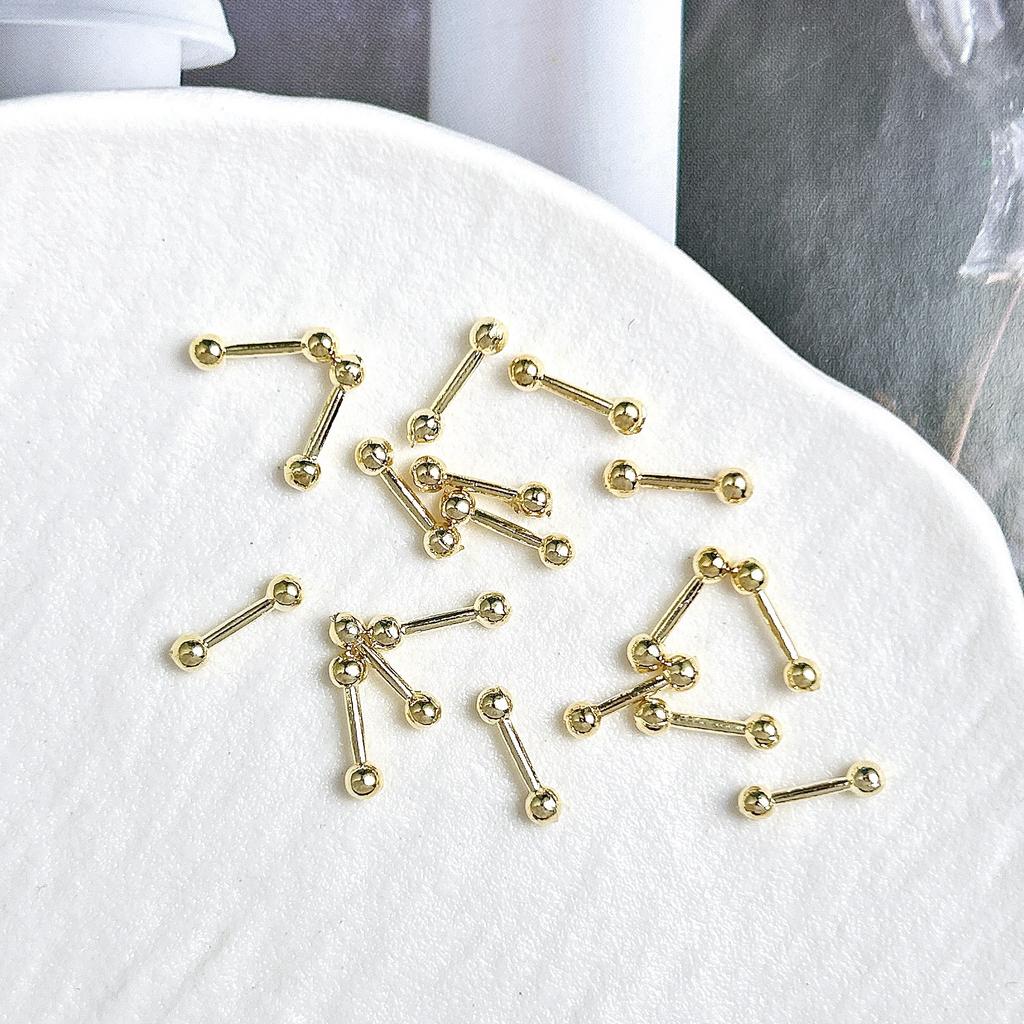 Legierung Gebogener Stab Augenbrauenstecker Außengewinde Doppelseitig Vergoldet Spitzkegel Punk Style Nagelkunst Zubehör DIY Nagel Süß Cool Dekoration DIY