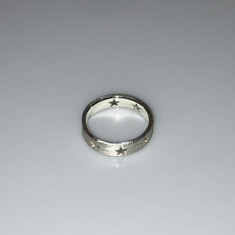 

fillow star hole ring silver