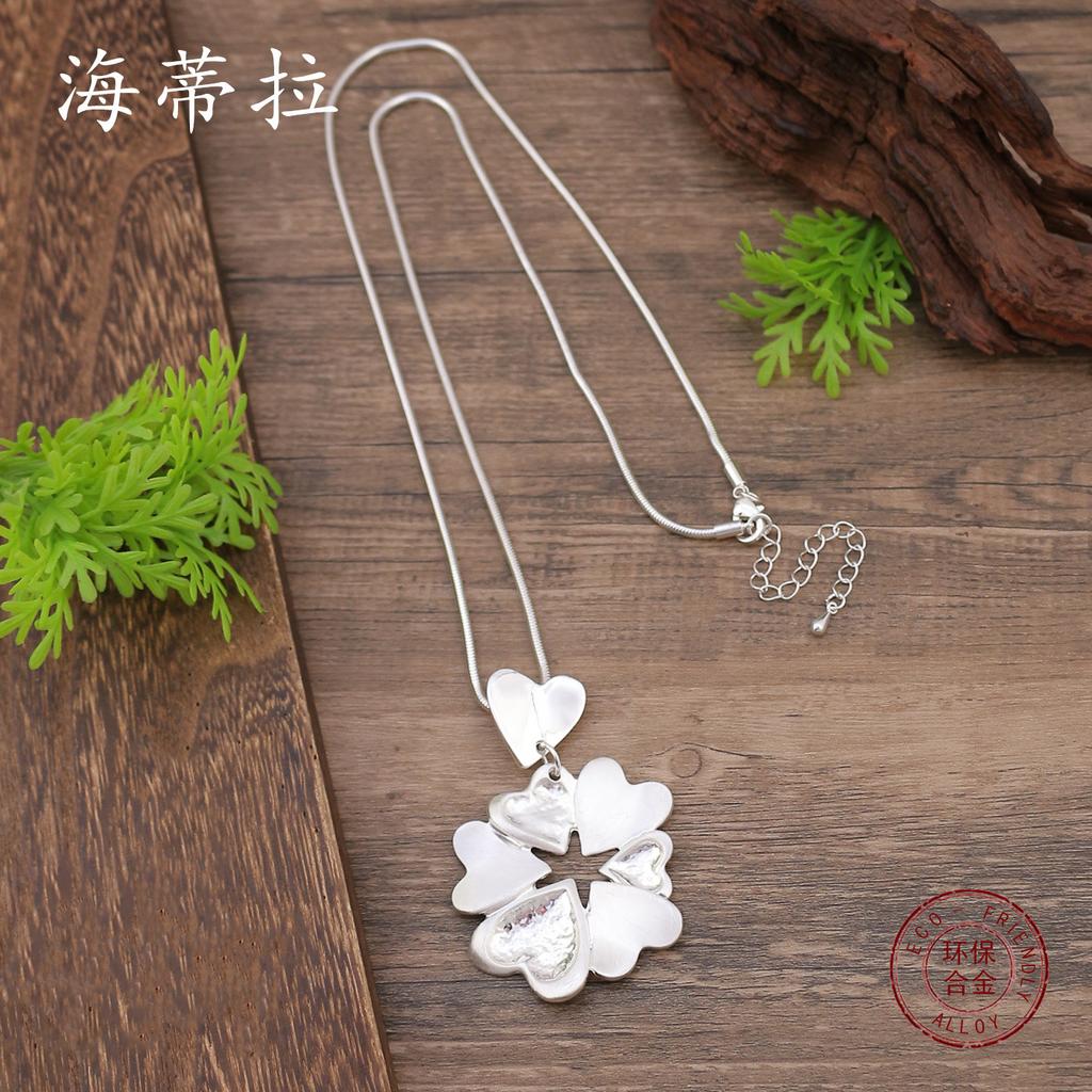 New brushed love flower snake bone chain long pendant, women's exaggerated hollow heart-shaped long necklace