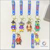 Creative Cartoon Character Keychain with Flexible Strap and Durable Metal Ring for Keys and Accessories Suitable for Everyday Use and Gift Giving