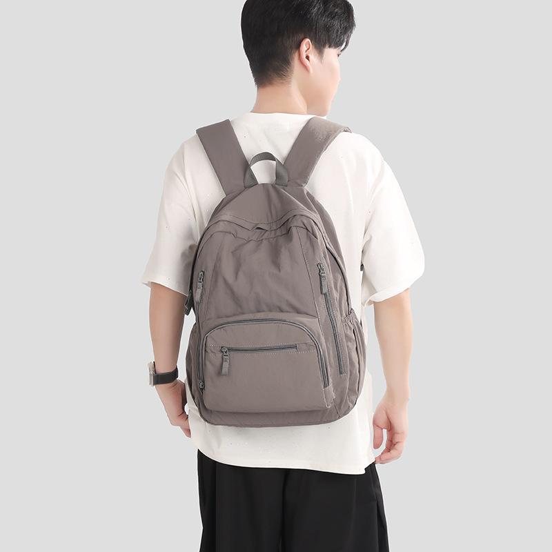 Schoolbag Korean version simple solid color backpack casual versatile short trip storage bag high value small fresh wear-resistant backpack