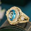 Klassisk Elegant Ring för Kvinnor Fest Bröllop Lyxiga Fingeraccessoarer Guld Färg Delikat Zirkon Inlagd Glänsande Blå