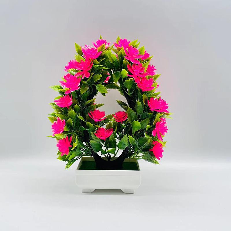 Künstliche herzförmige Nelumbo Sp Pflanze mit rosa und roten Plastikblüten zur Heimdekoration