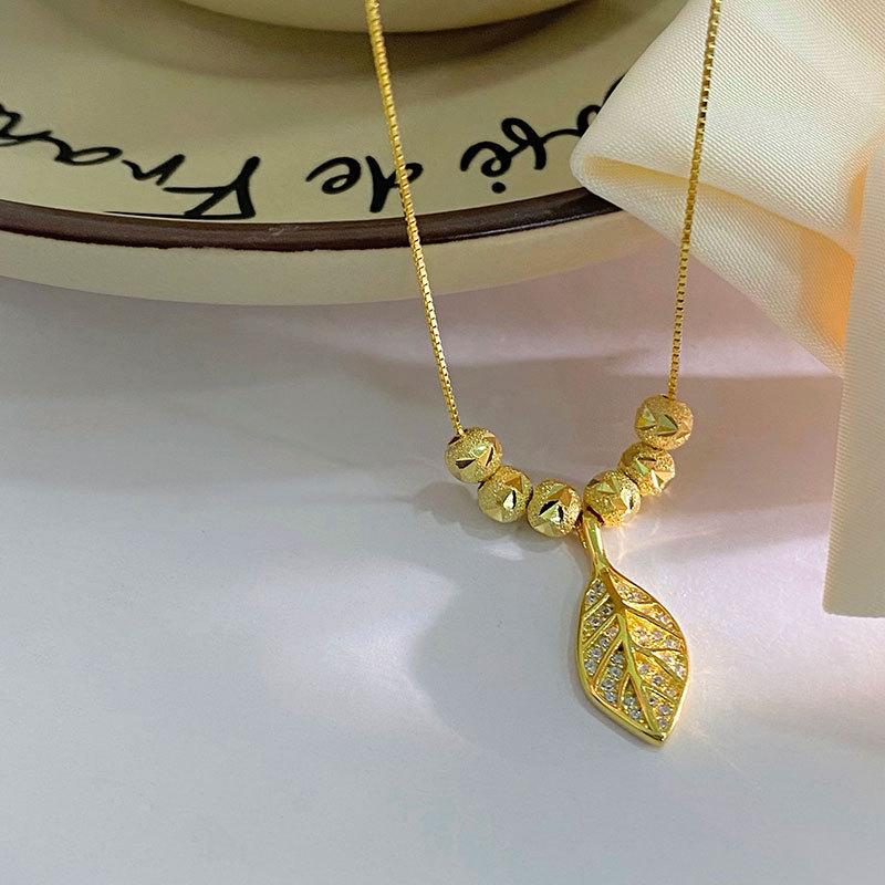 

Золотая ветка Нефритовые листья Автомобильный цветок бусины ожерелье Женское ожерелье лист Универсальная ключичная цепочка Niche Sense
