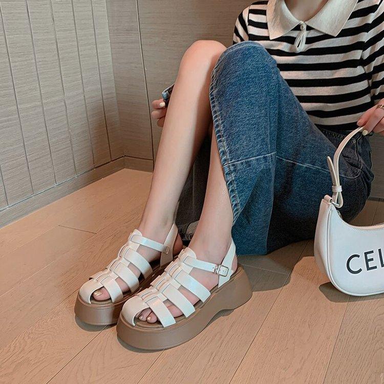 

Thick-soled woven hollowed-out Roman sandals women s summer new retro flat-soled one-word buckle with bag head sandals 40