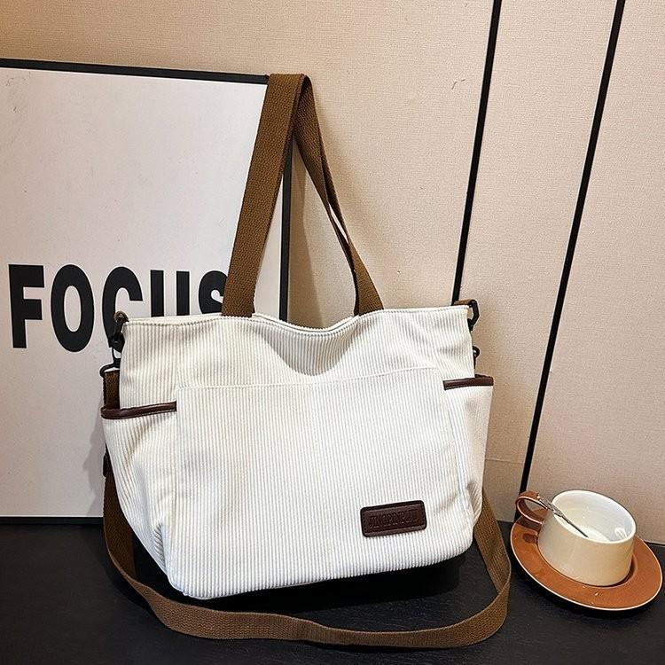 Spacious Canvas Shoulder Bag For Women In Stylish Minimalist Urban Design Ideal For Casual Travel