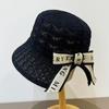 Korean Style Hollow Knit Women's Summer Bucket Hat - Sun Protection, Face Slimming, Hand-Knitted, Versatile.