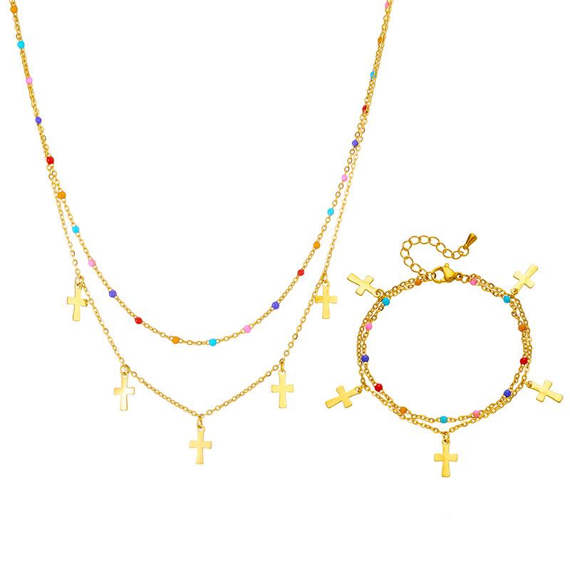 gold cross pendant layered necklace with colorful beads for women