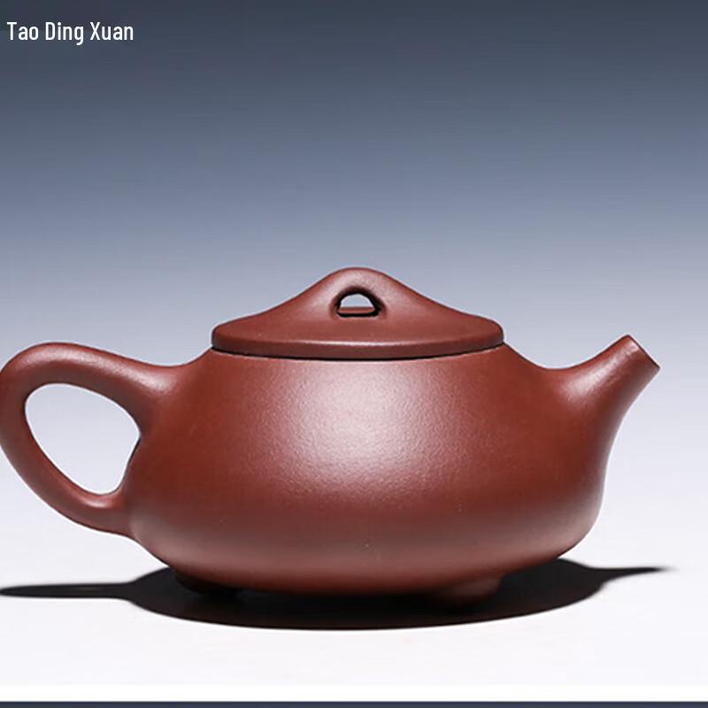 Tao Ding Xuan Lotus Zisha Shi Piao Teapot