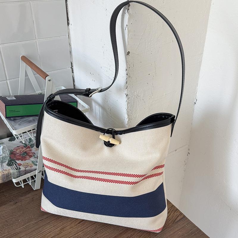 Niche High-value Handbag Small Bag Women's 2025 New Striped Canvas Bag Fashionable Shoulder Crossbody Bucket Bag