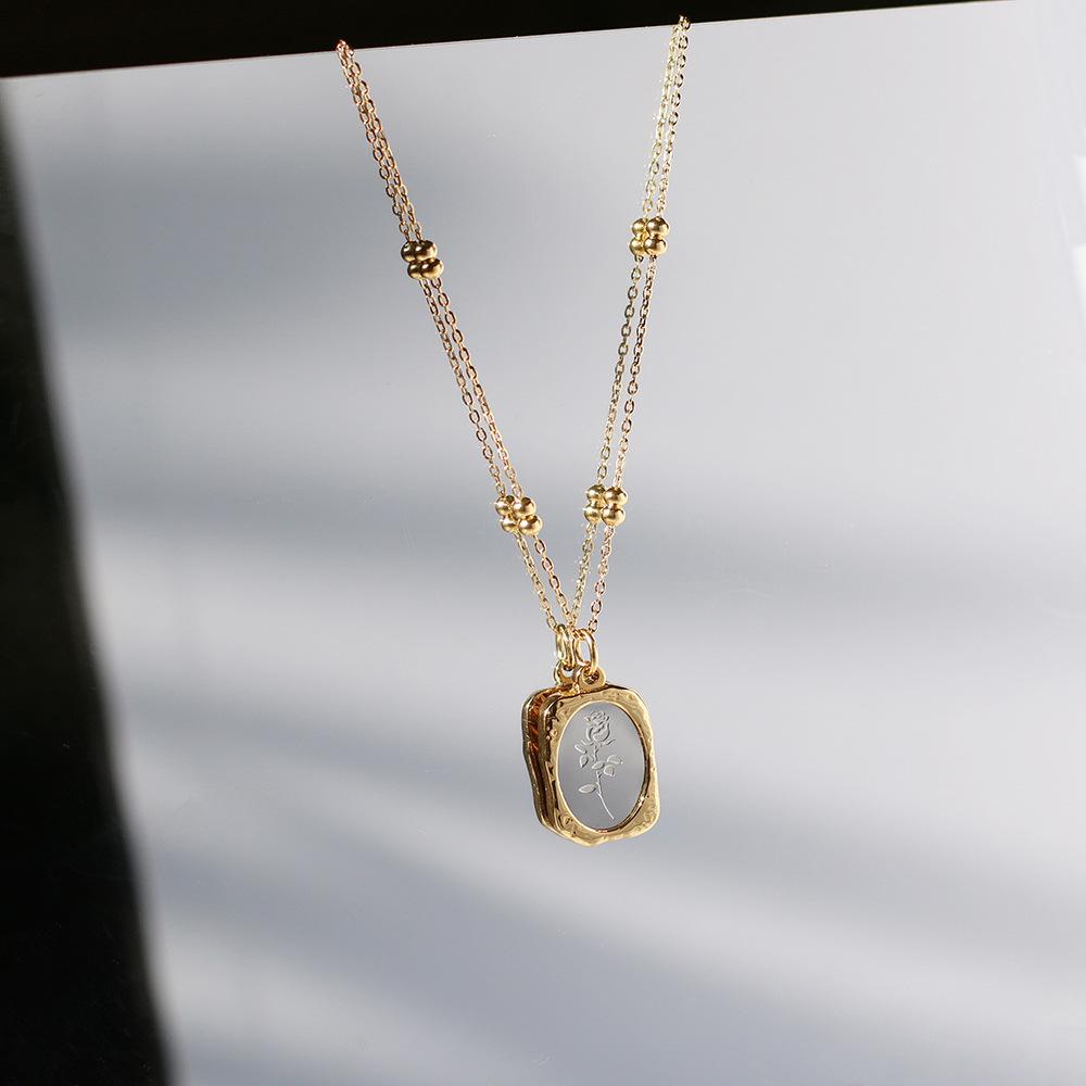 European & American Vintage Rose Necklace: Magic Mirror Relief, Round Bead Chain, Titanium Steel Gold Clavicle Design for Women.