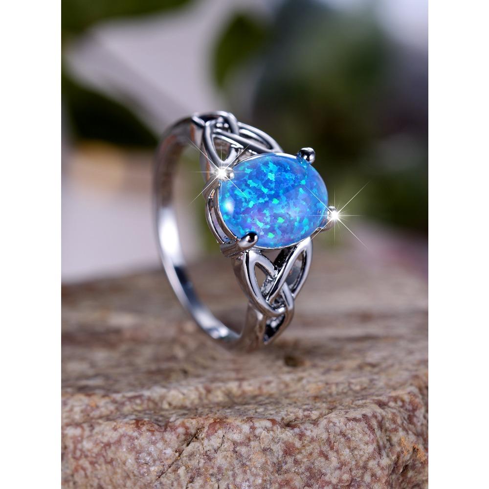 Fashionable Commuting Egg Shaped Blue Border Cross Ring