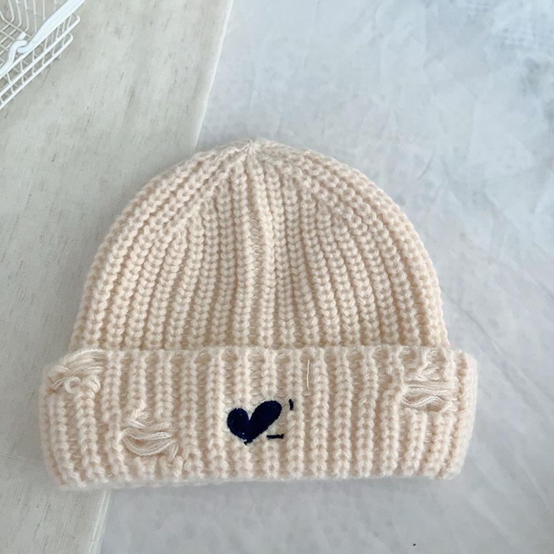 Autumn and winter new thickened campus style love hole knitted hat, male and female couples warm ear protector pullover hat