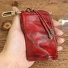 Men's Retro Genuine Leather Waist Key Holder: Large Capacity Cowhide Bucket Bag with Multifunctional Zipper Pouch.